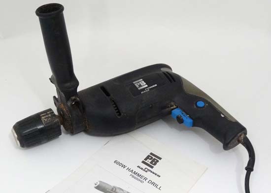 Power Base Hammer Drill CONDITION: Please Note -  we do not make reference to the condition of