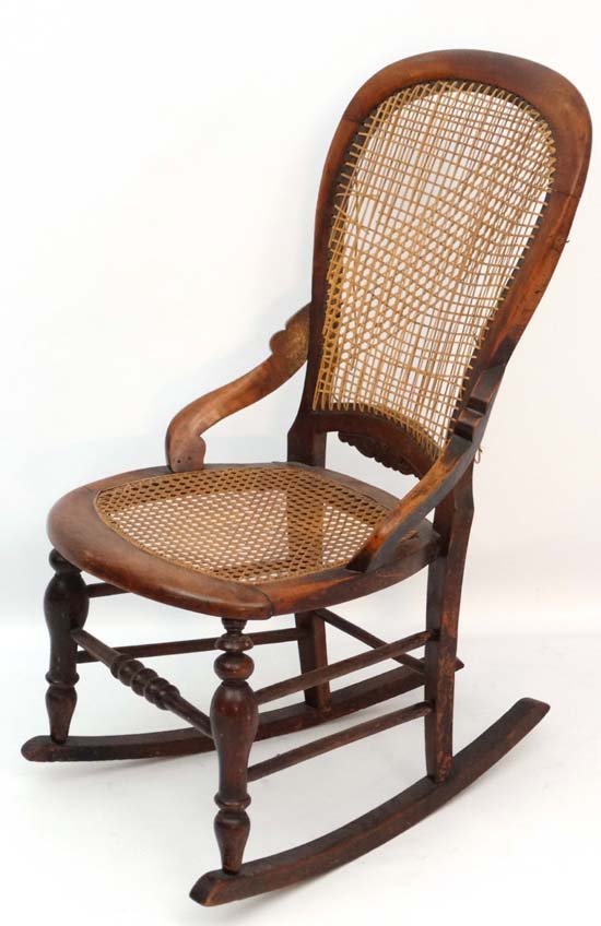 A c.1860 Victorian stained walnut rocking chair with caned seat and back and quantity of restorers - Image 4 of 5