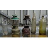 2 oil lamps ( Aladdin  Coleman) a North and Randall soda siphon and 2 bottles ( Essolube and a