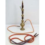 A Hookah / water pipe / narghile / arghila / qalyan / shisha of brass construction with 2 pipes 44