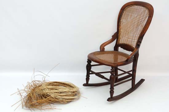 A c.1860 Victorian stained walnut rocking chair with caned seat and back and quantity of restorers - Image 3 of 5