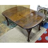 A c.1900 walnut wind out dining table with pad feet 41" wide x 57" extended  CONDITION: Please