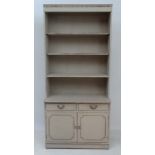 Vintage Retro : a mid 20 thC cream painted narrow dresser with 4 open front shelves, under a
