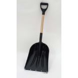 A large snow shovel with steel tip CONDITION: Please Note -  we do not make reference to the