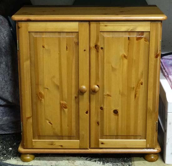 Two door pine cupboard CONDITION: Please Note -  we do not make reference to the condition of lots