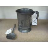 A PEWTER PINT MUG from The Hole in the Wall, Baldwins Gardens, Grays Inn, and a PEWTER SPOON with