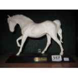 A MODEL 'Spirit of Freedom', on a wooden plinth base, 8.25" overall, Beswick