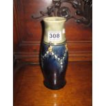 A GLAZED EARTHENWARE VASE with face mask and floral garland decoration, 9", Royal Doulton