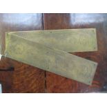 A PAIR OF BRASS DOOR PLATES with engraved decoration, 12" x 3"