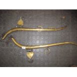 A PAIR OF BRASS HORSE HAIMES, double cased, size 3