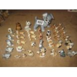 A COLLECTION OF THIRTY NINE WADE WHIMSIES, Disney dogs, cats, owls, skunk etc and blown-up Scamp