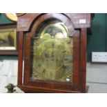 AN OAK AND MAHOGANY LONG CASE CLOCK, the hood having a broken swan neck pediment with brass spread