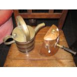 A COPPER CHOCOLATE POT of D-form with turned wooden handle, 7", and a BRASS WATER CAN with copper