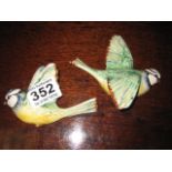 A PAIR OF POTTERY WALL PLAQUES of Blue Tits, 707, 705, Beswick