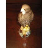 A MODEL of a Buzzard, Whyte & Mackay Scotch Whisky decanter, 6.75", Beswick