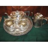 AN EPNS A1 TEA SET of three pieces in the Georgian style, together with a gallery edged SERVING TRAY