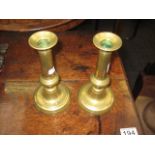 A PAIR OF BRASS CANDLESTICKS with knopped stems to circular bases, 7.5", 19th Century