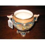 A PORCELAIN TWO HANDLED URN SHAPED VASE with hand painted floral decoration, 5", Hadleys, Worcester