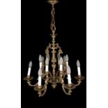 lustre en bronze de style Louis XIV - rocaille à six branches et douze feux
lustre en bronze doré de