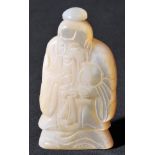 * Snuff bottle. A 19th century mother of pearl snuff bottle, carved in figural form depicting the