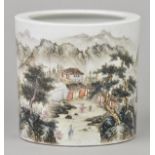 * Brush Pot. A Chinese porcelain bidong or brush pot, decorated with a mountain landscape with trees