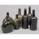 * Bottles. A collection of early 19th century and later glass bottles, including a sealed bottle