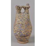 * Folk Pottery. A Spanish folk pottery botigo or drinking vessel, cold painted decoration in blue,