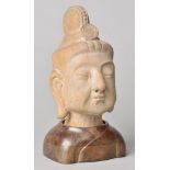 * Buddha. A hollow terracotta bust probably Northern Indian, modelled with characterful face,