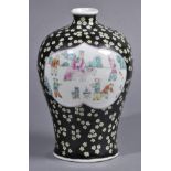 * Chinese Vase. A Chinese porcelain meiping vase decorated famille noire with two vignettes