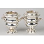 * Wine Coolers. A pair of 19th century silver plate wine coolers, of ogee form with gadrooned and