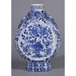 * Bianhu. A Chinese porcelain moon flask or bianhu with moulded qilong handles, decorated with