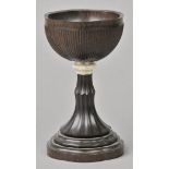 * CITES Chalice. A Victorian coromandel chalice, the carved cup with ivory knop and flared tapered