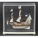 * Golden Hind. A fine miniature 1-200 model by Basil Peter, in a Perspex display case with brass