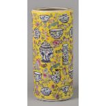 * Umbrella Stand. A Chinese porcelain umbrella stand decorated with famille jaune enamels showing