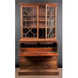 * Secretaire. A William IV/early Victorian mahogany secretaire bookcase, the dentil moulded