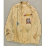 *Nose Art. A WWII U.S.A.A.F. Bar Steward’s jacket, profusely decorated with cartoon characters and