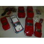 *Model Cars. A tray containing five Ferrari 1:16 to 1:24 scale models by Burago, together with a BMW