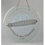 *Zeppelin. A fine glass wall plate depicting Zeppelin LZ 127, of circular form, etched into the