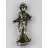 *Charlie Chaplin. A petit and well-detailed chromium-plated mascot, engraved  ‘Registration