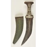 *Jambiya. A 19th-century Arab dagger, the 19.5cm curved steel blade with horn grip applied with