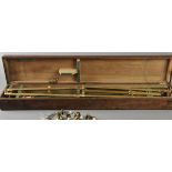 *Pantograph. A late Victorian brass pantograph, engraved with scales, 97cm long with various