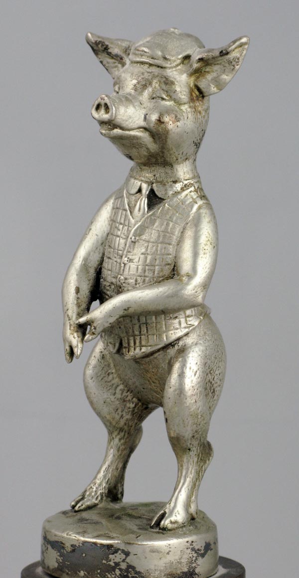 *Standing Pig Mascot by E. Holt. A character mascot, depicting a pig wearing a chequered waistcoat