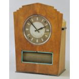 *Clock. An Art Deco electric clock, the circular glass dial signed  ‘Helma Neon Electric Clock, Made