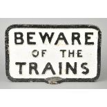 *Railway Sign. A cast iron sign for  ‘Beware of the Trains’, painted in black and white, 32cm high x