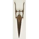 *Katar. A 19th-century Indian dagger, the 20cm thick steel blade engraved with scrolls and armour