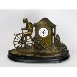 *Velocipede Mantle Clock. Created from moulded brass, it features a transitional velocipede and