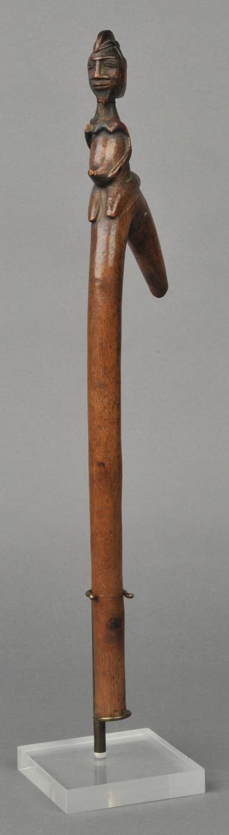 * Burkina Faso. A Lobi Janus tribe dance staff, carved with double headed tribesman on supporting