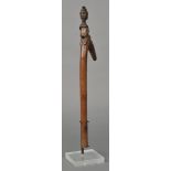 * Burkina Faso. A Lobi Janus tribe dance staff, carved with double headed tribesman on supporting