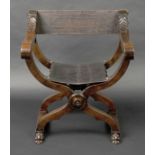 * Dantesca Chair. An Italian walnut Dantesca chair, circa 1900, the x-frame with leather back and