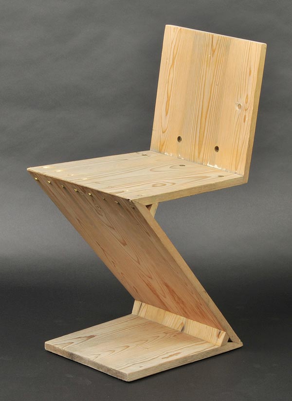 * Gerrit Rietveld (1888-1964). Zig Zag chair, pine construction with brass screws and nuts,